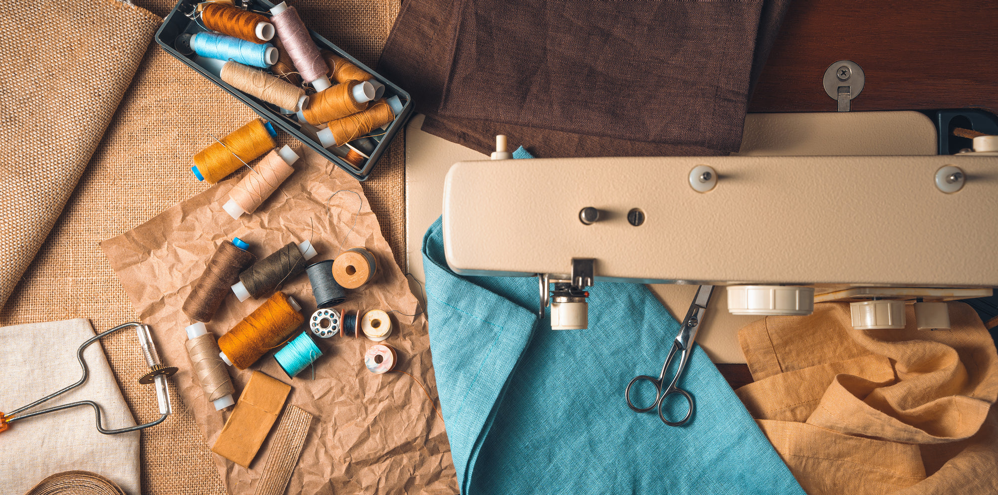 Slow Fashion image of sewing machine, fabric and materials